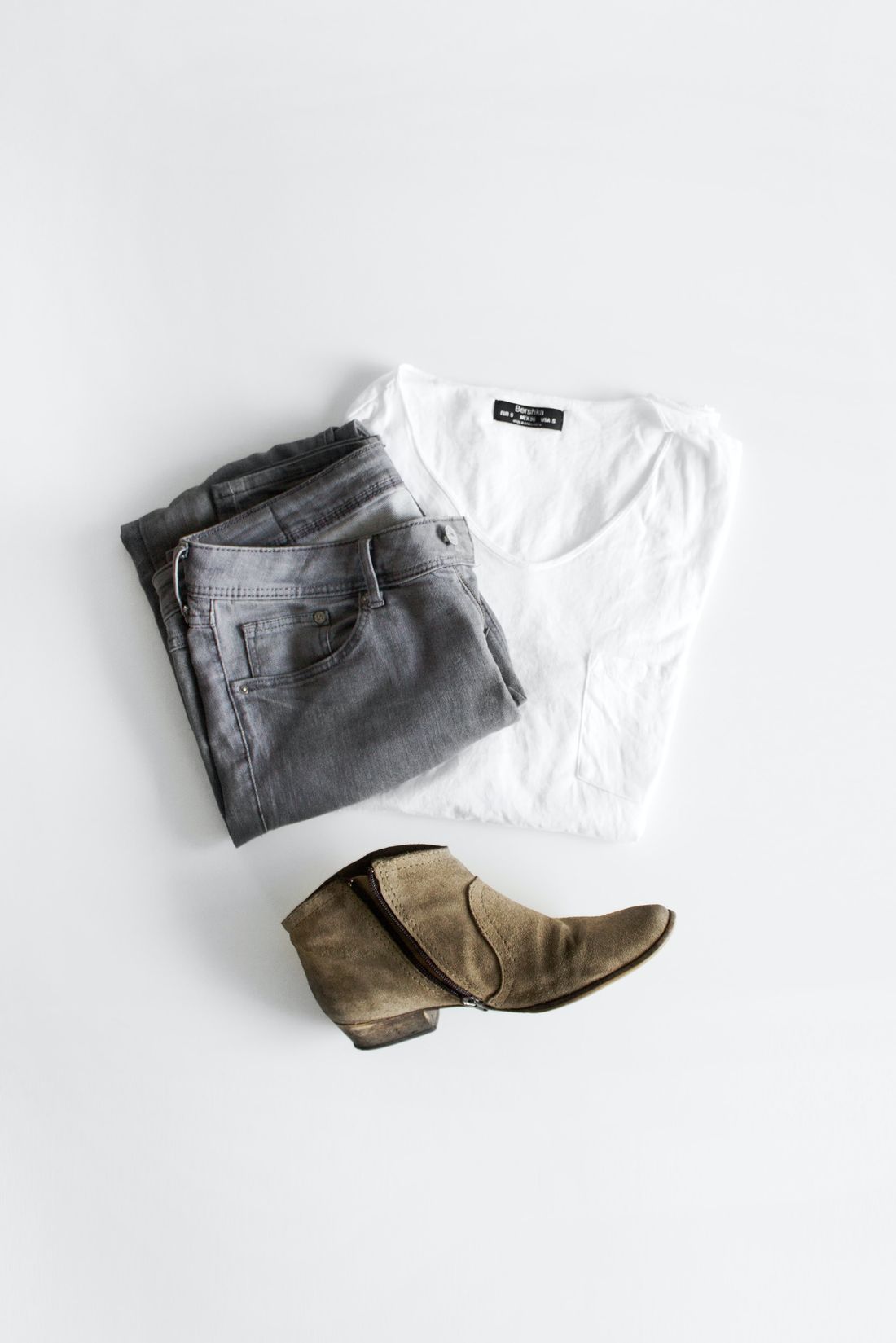 Flat lay of shirt and jeans